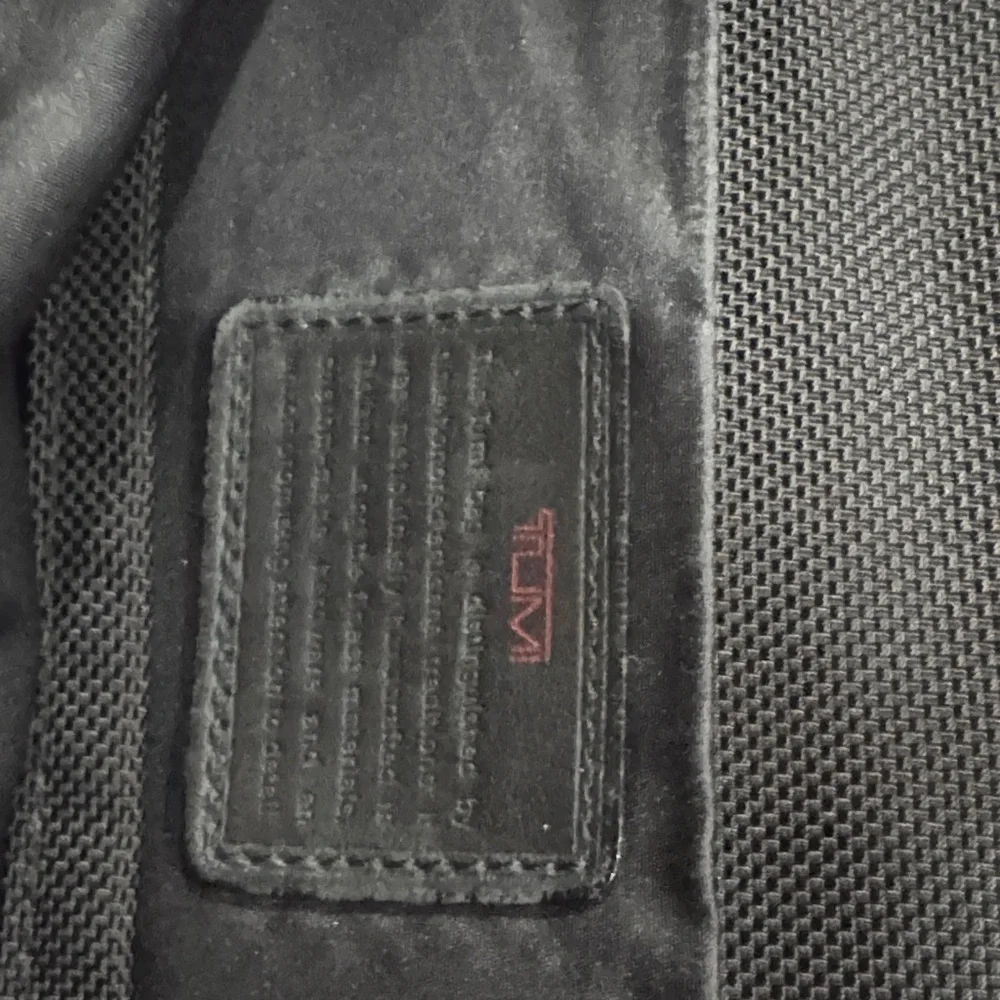 Tumi Black Men's Messenger Bag with Leather Trim